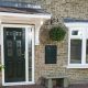 Black Composite door with hanging plant pot, installed in Oxford by Paradise Windows