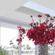 Bunch of Red Flowers in Modern Room with a Lantern Roof